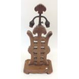 A Chinese carved wooden table lamp, 43cm