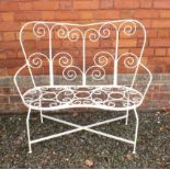 A vintage conservatory or garden wrought iron settee, 100cm wide