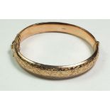 A 9 ct rose gold bangle, 11 gm