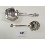 A silver tea strainer, Sheffield 1940 by Viners, 44g and a sifter spoon, 17g