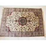 A gold ground Kashmir style rug with floral medallion design 171 x 160cm