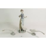 A Lladro figure of a girl with two geese