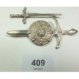 Two Scottish silver sword form kilt pins or brooches