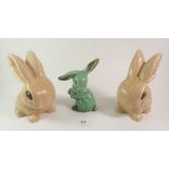 Three Sylvac rabbits. Largest 14cm.