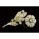 A fine early 20th century diamond set floral spray brooch (18ct white gold or platinum) 7.6g, 4.8 cm