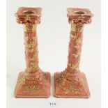 A pair of Locke & Co Worcester candlesticks with applied leaf decoration, 23cm