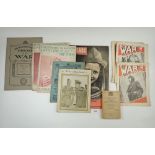 A WWII Field Surgery pocket book, a First Aid Journal and various magazines