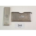 A silver card case with engraved decoration and a silver rizla case Birmingham 1900