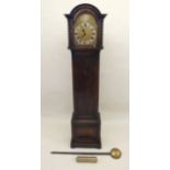 An early 20th century oak longcase clock with brass dial and barley twist pilasters to face