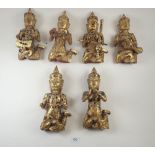 A set of six Chinese gilt carved wood budhist temple figures, 25cm tall
