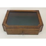 A Mappin and Webb glazed oak jewellery table top display case