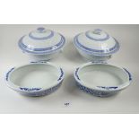 A pair of Chinese blue and white tureens, chipped to lids and a pair of similar oval serving dishes