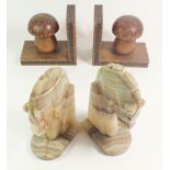 A pair of French wooden book ends in the form of mushrooms 12cm tall and a pair of onyx book ends