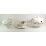A Wedgwood Moss Rose dinner service comprising: two lidded tureens, vegetable dish, three