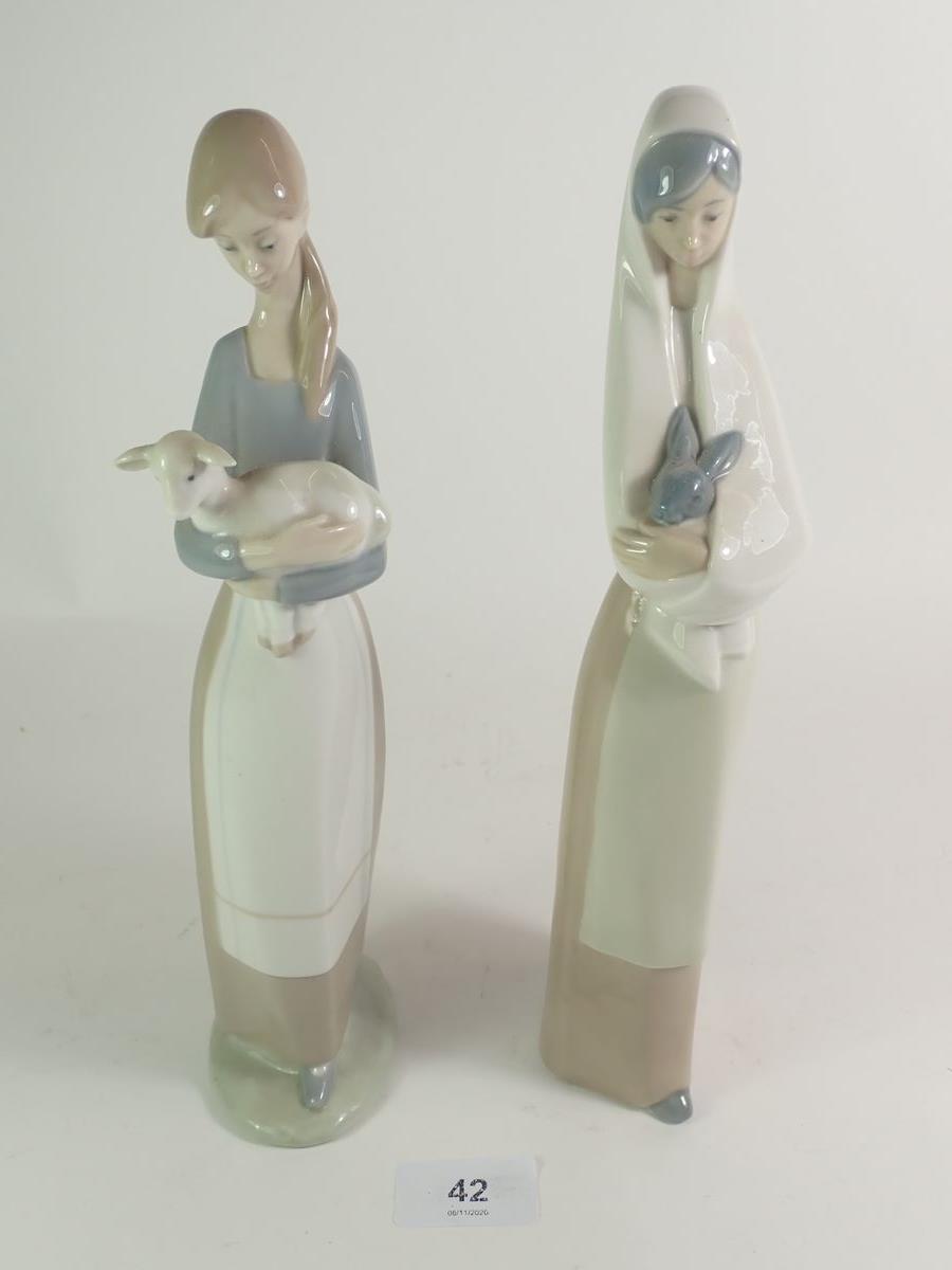 Two Lladro figures with rabbit/lamb