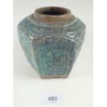 A Chinese stoneware jar with green glaze - 13cm tall.