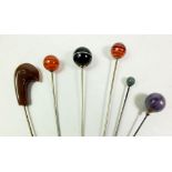 Six various stone set hatpins including banded agate