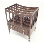 A mahogany reproduction Canterbury style magazine rack