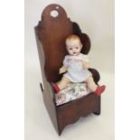 A Victorian mahogany child's lambing chair with commode seat