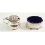 A silver mustard pot with blue glass liner, Birm 1941, together with a silver salt with glass liner,