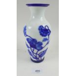 A Chinese blue cameo glass vase with overlaid and carved decoration, 21cm tall