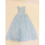 A 1960's blue net bridesmaids dress