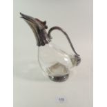 A vintage swan or goose form glass decanter with silver plated mounts