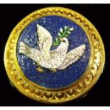 An Italian miniature mosaic brooch with dove holding an olive branch on a blue ground, within gold