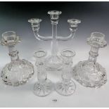 A group of moulded glass candlesticks