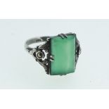 A silver marcasite and jade ring marked 935, size N/O