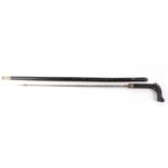 Sword stick, 22½ ins tapered blade, black painted wooden shaft and handle, brass collar