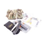Two Gerber pocket saws; Canvas camo pouch containing five various safety knives - all as new