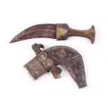 Arabian Jambia with 5 ins ribbed blade (a/f) with decorated mount to studded wooden hilt,