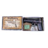 .177 The Webley Junior air pistol, fluted tin grips with darts and pellet pack in maker's box,