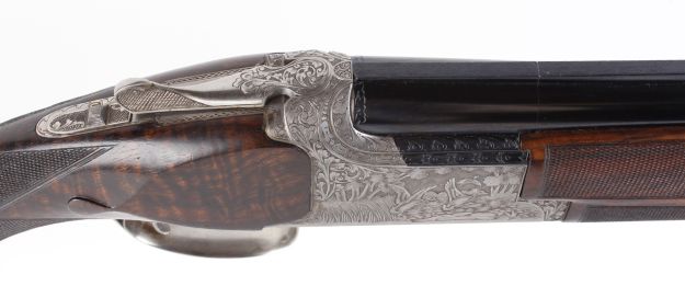 (S2) 12 bore Bader engraved Browning B25 over and under, ejector, 27¾ ins barrels, Teague choked - Image 5 of 11