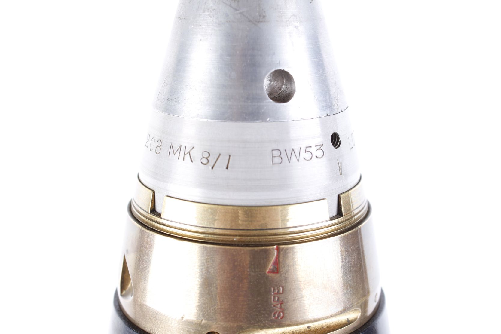 4¾ ins hollow shell with British 1953 Type 208 Mk 8/1 brass and alloy artillery fuse, no. 008519