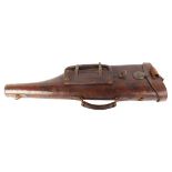 Vintage leather leg o' mutton gun case with external cartridge pouch, brass locking catch, for up to