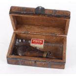Metal banded carved wooden pistol case, with copper powder flask