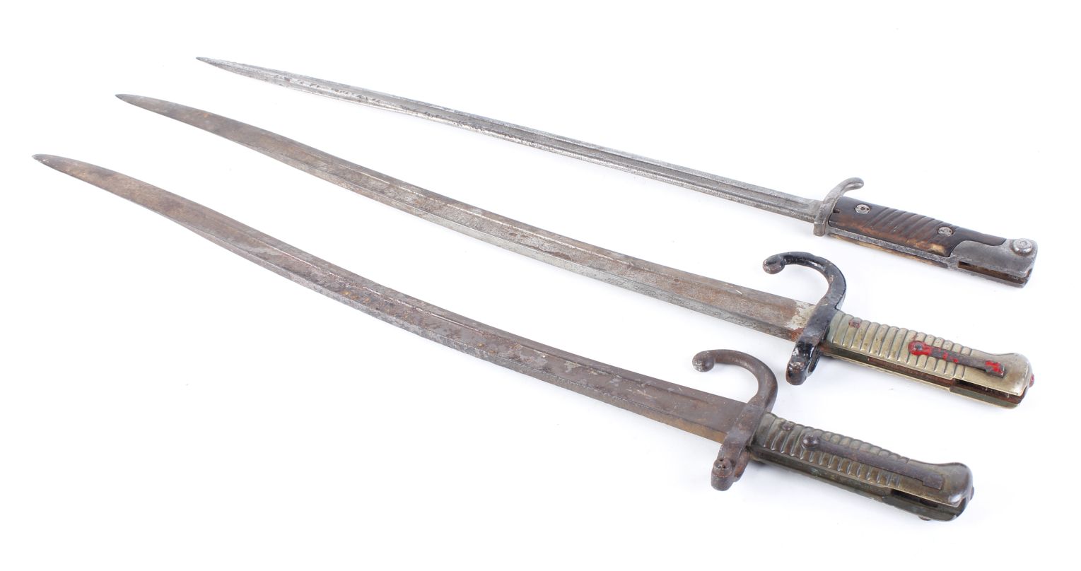 Model 1898 Mauser Quillback bayonet together with two Chassepot bayonets, dated 1872 and 1874