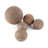 4 x small cannon balls (5.6, 4.9, 4.6, 3.7 lbs) and 1 x large cannon ball (23.9 lbs)