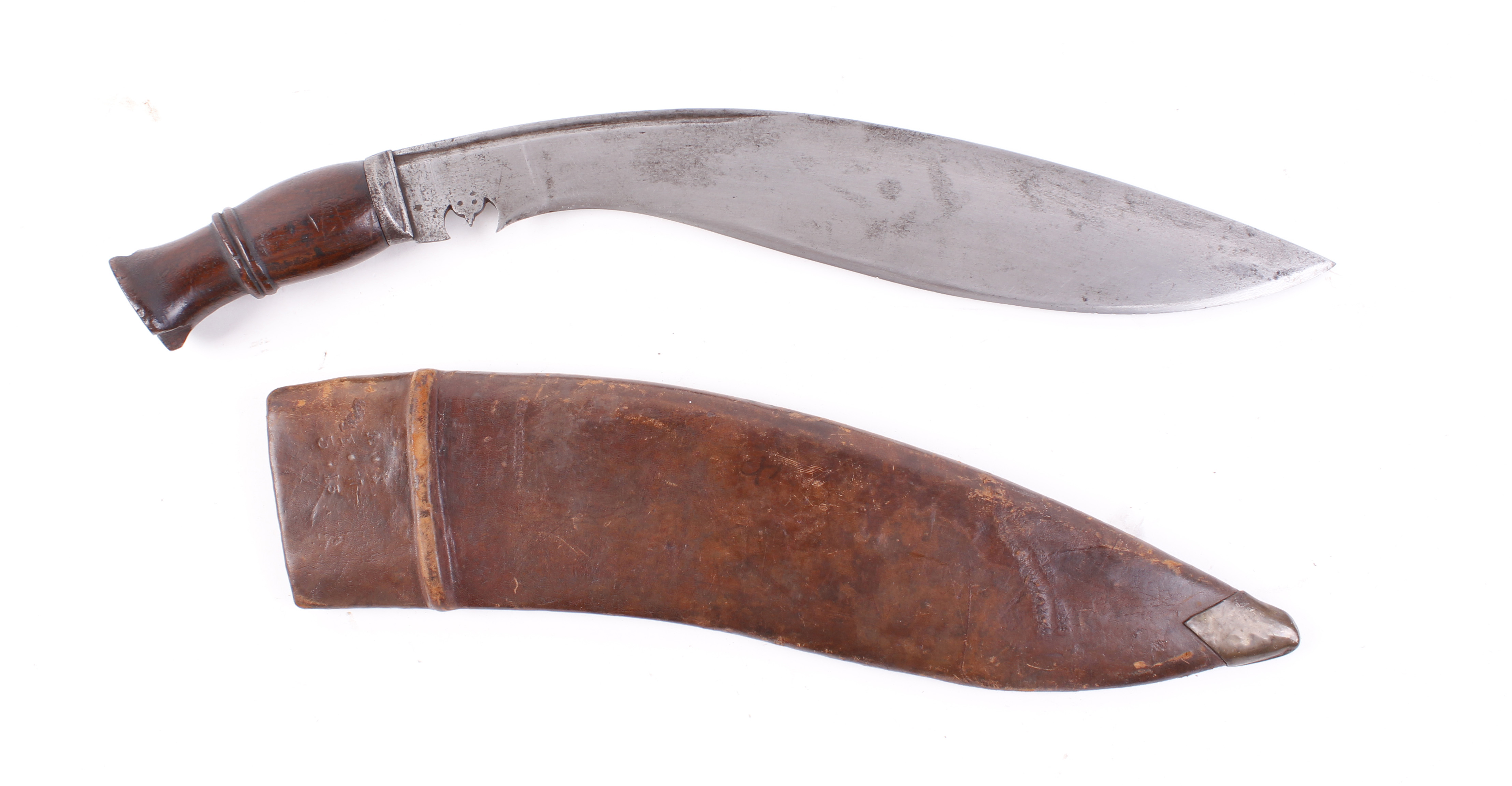 Military kukri 14 ins, marked r p 6.04 wooden carved grip in brown leather sheath marked a.s f.w 3.