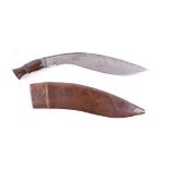 Military kukri 14 ins, marked r p 6.04 wooden carved grip in brown leather sheath marked a.s f.w 3.