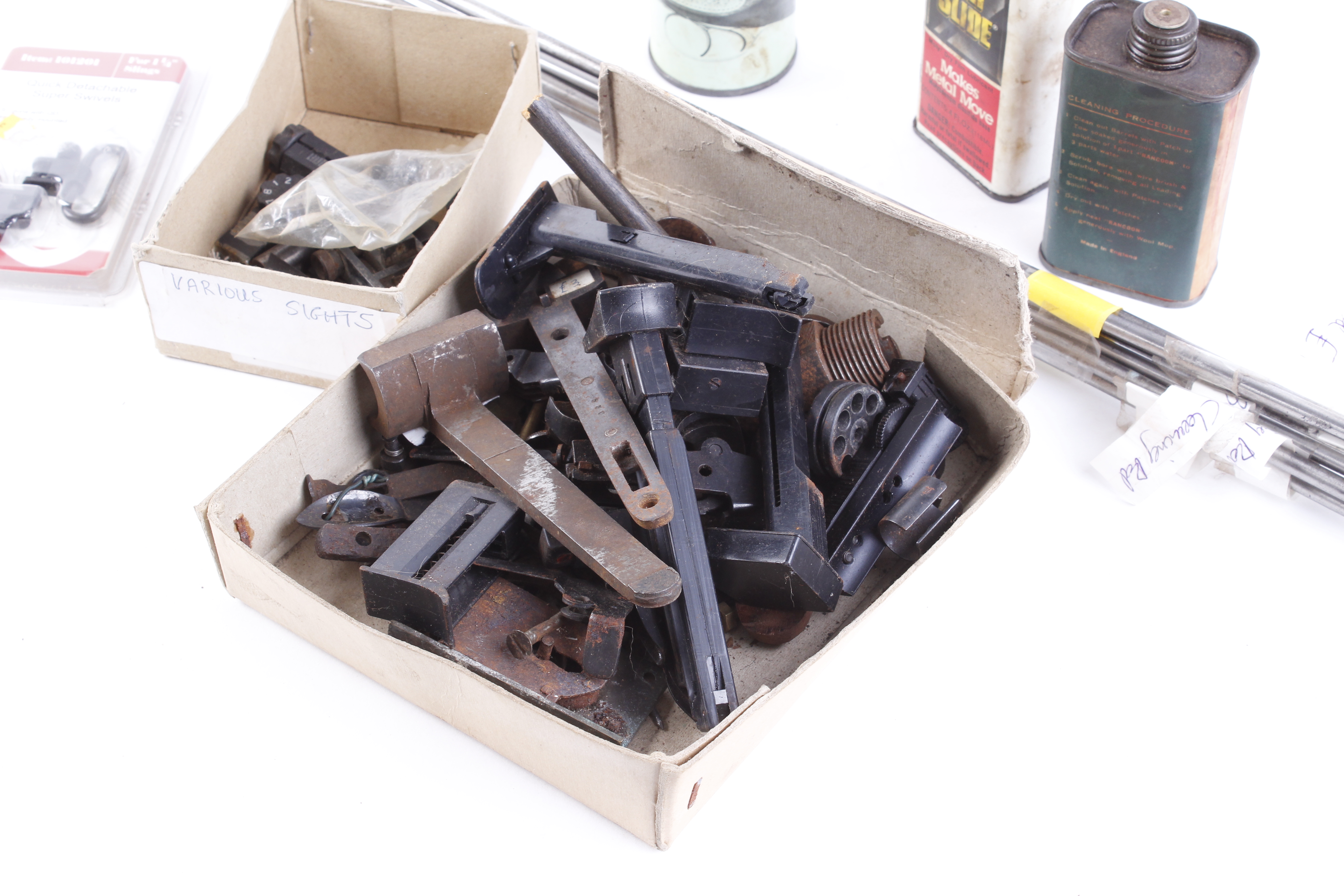 Six WW II .303 cleaning rods; gun sight assemblies; swivels; foresight blades, forend catch; old oil - Image 2 of 5