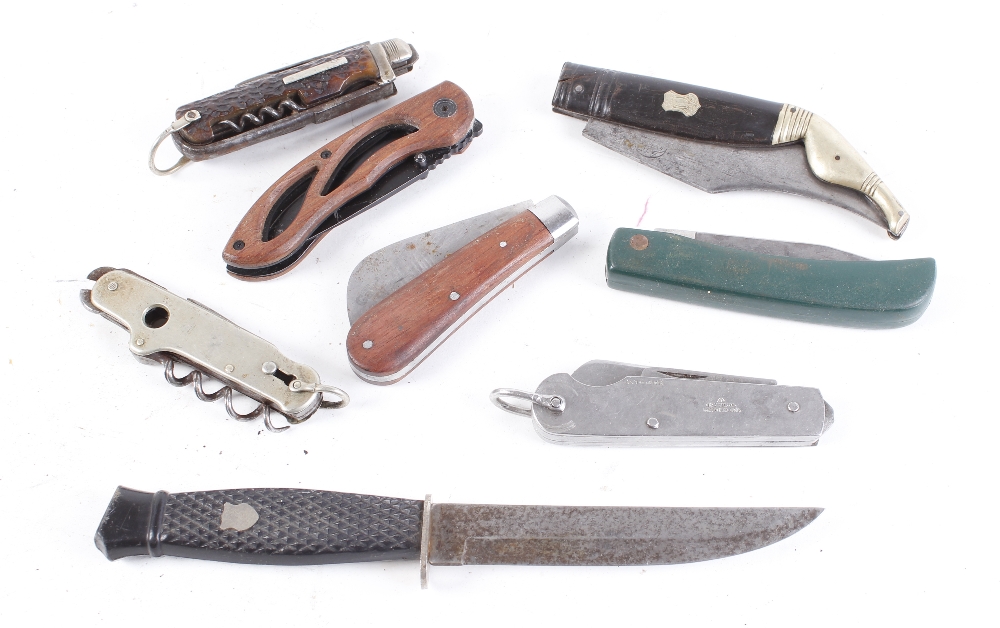 Seven various folding knives and a fixed Solingen blade, incl. 1945 J.R Holland folding knife [Note: