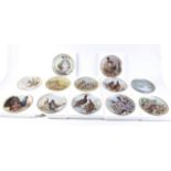 A fine complete collection of 12 Limoges porcelain plates depicting Game Birds of the World