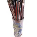 Large quantity of shotgun cleaning rods in powder drum