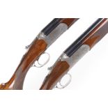 (S2) A fine pair of Battista Rizzini Round Body Custom over and under shotguns c.2011 engraved by