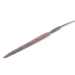 Hunting spear, 12¾ ins double edged tip, wired to wooden shaft, overall 49 ins [Note: Under the