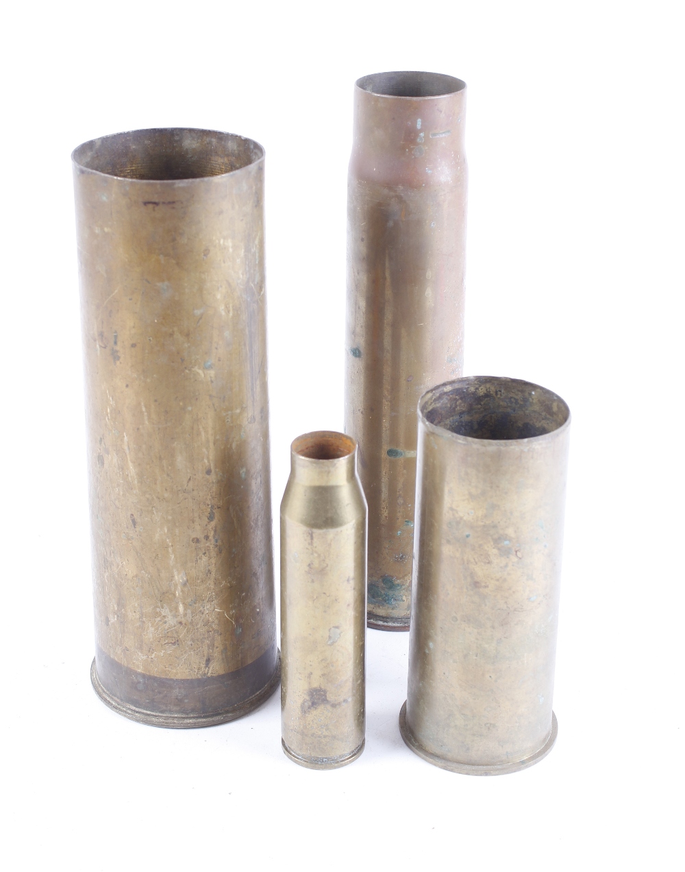 Four brass shell cases incl.: WWII 25pdr, stamped 1944; 6pdr; 30mm AFV; engine start case marked