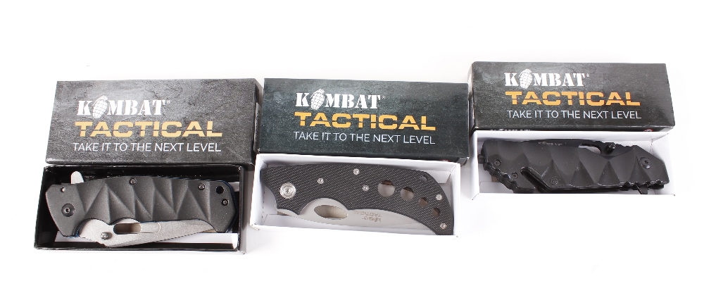 Three folding tactical knives by Kombat, boxed [Note: Under the Criminal Justice Act 1988 & Knives